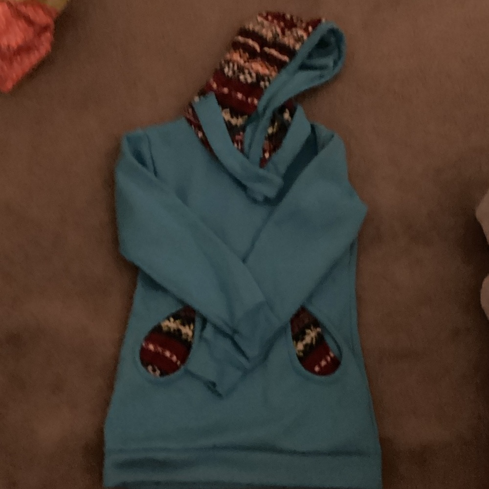 Blue Hoodie with Patterned Accents